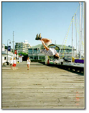 BT doing back flip in front of Cucina Cucina's Seattle WA