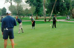12-20-97MTGolfTourny-Scottputting-sm.jpg (10552 bytes)